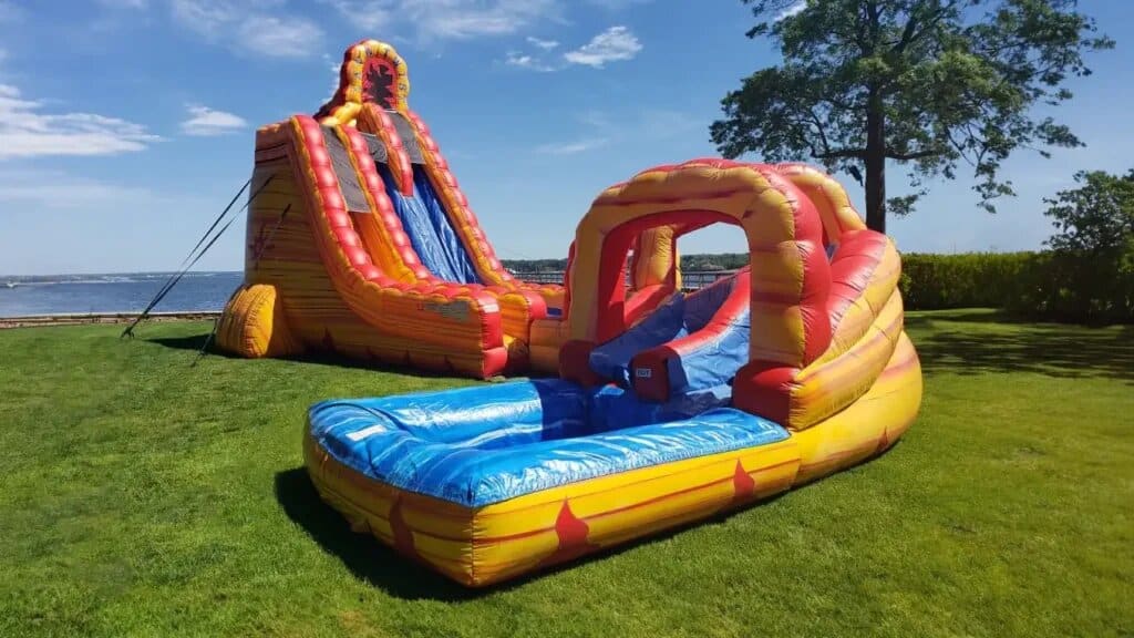 27 Foot Lava Twist Water Slide (50’L X 30’W X 27’H) rental at an event