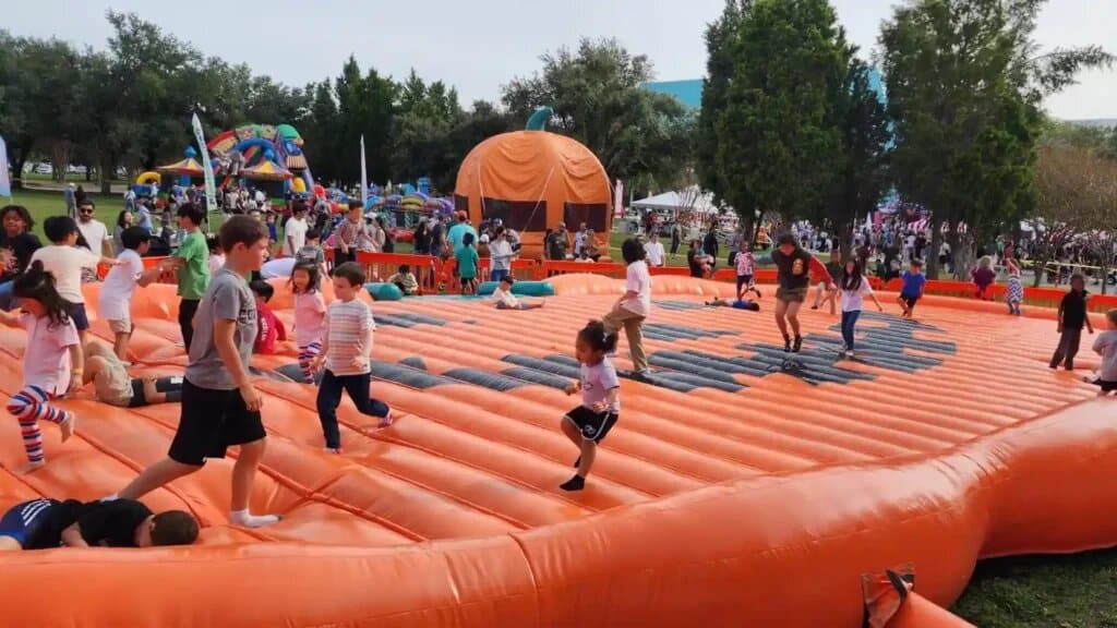 Halloween Pumpkin Jump Pad rental at an event