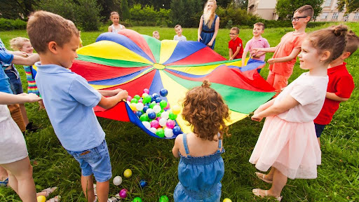 kids playing colorful ball game